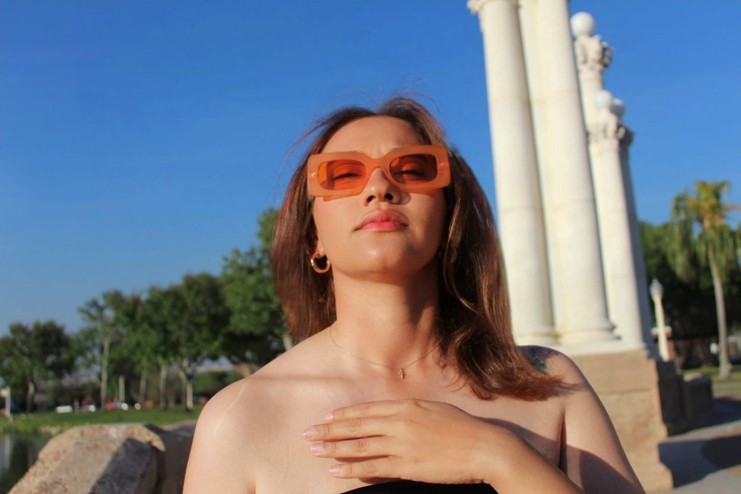 “Close-up of Cloud Jelly Sun sunglasses in vibrant Orange with a glossy jelly texture”